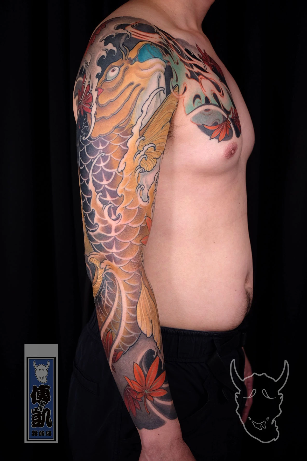 Japanese koi fish arm sleeve tattoo with wave and scale details, symbolizing strength, determination, and the pursuit of success in traditional Irezumi style.