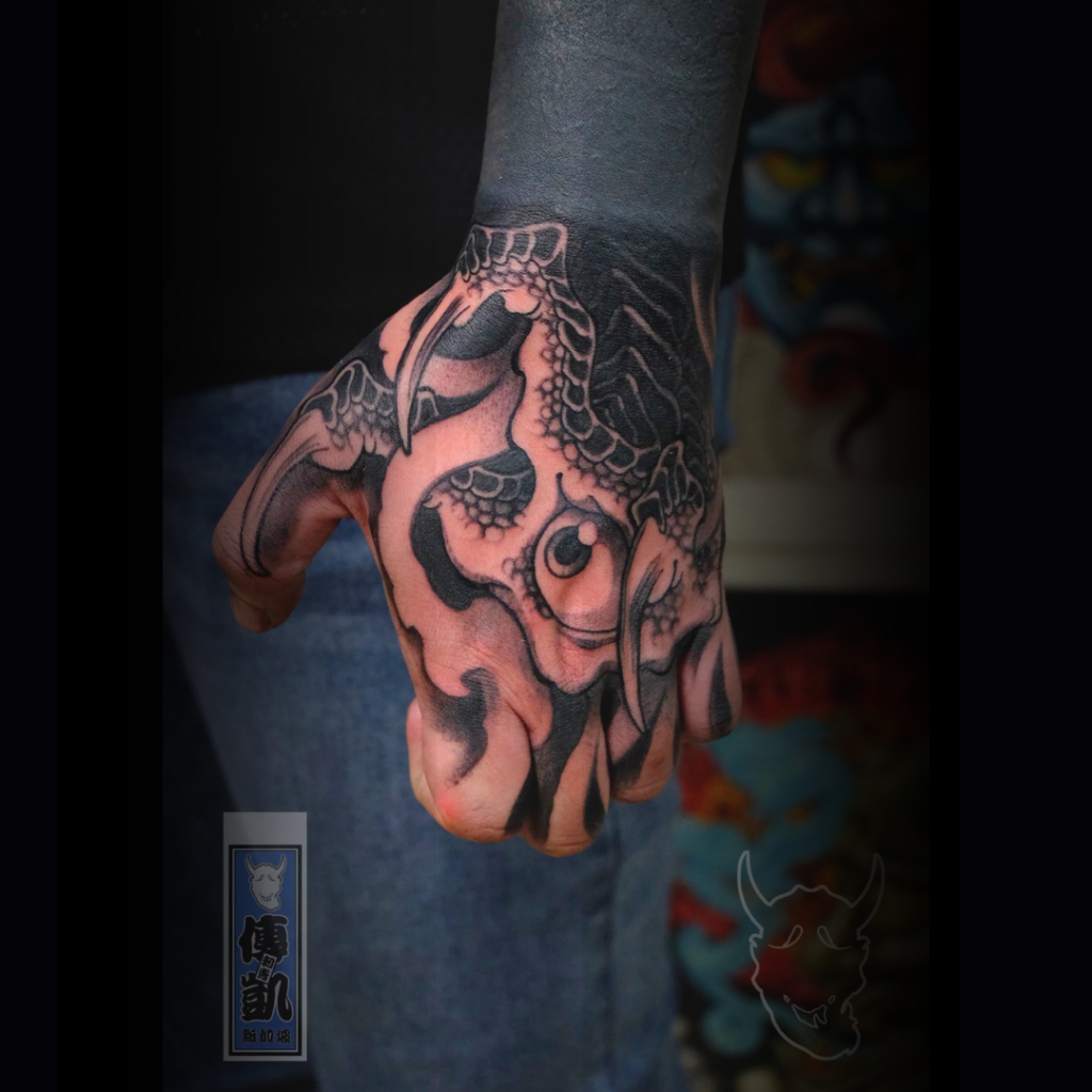 japanese-dragon-claw-hand-tattoo-black-and-grey-singapore-ck-tattoo.png
