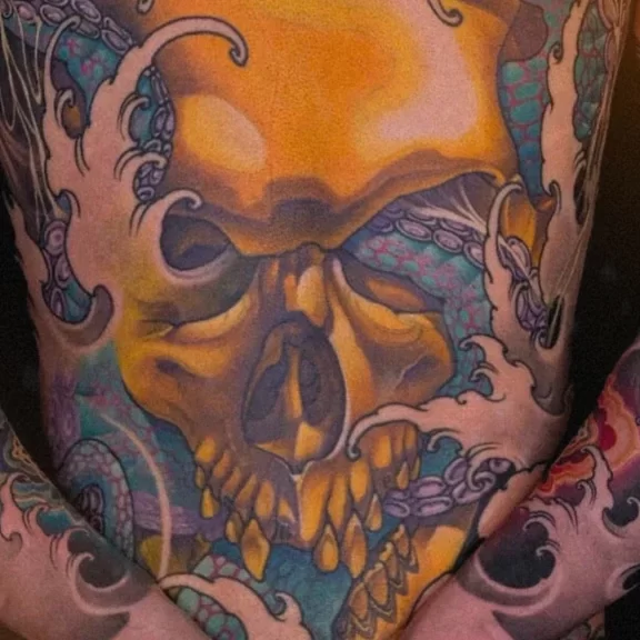 New Traditional Japanese tattoo of a skull and octopus, full backpiece with flowing waves and intricate tentacle detailing.