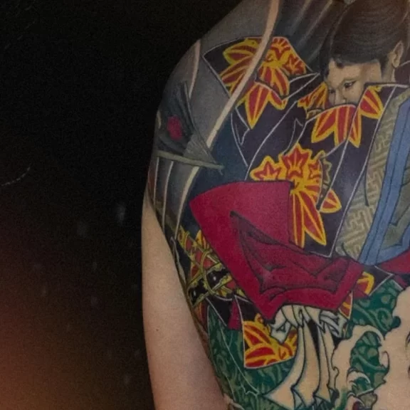 Neo Traditional Japanese tattoo of a samurai and onna in New Traditional Japanese style, full backpiece with dynamic motion and narrative composition.